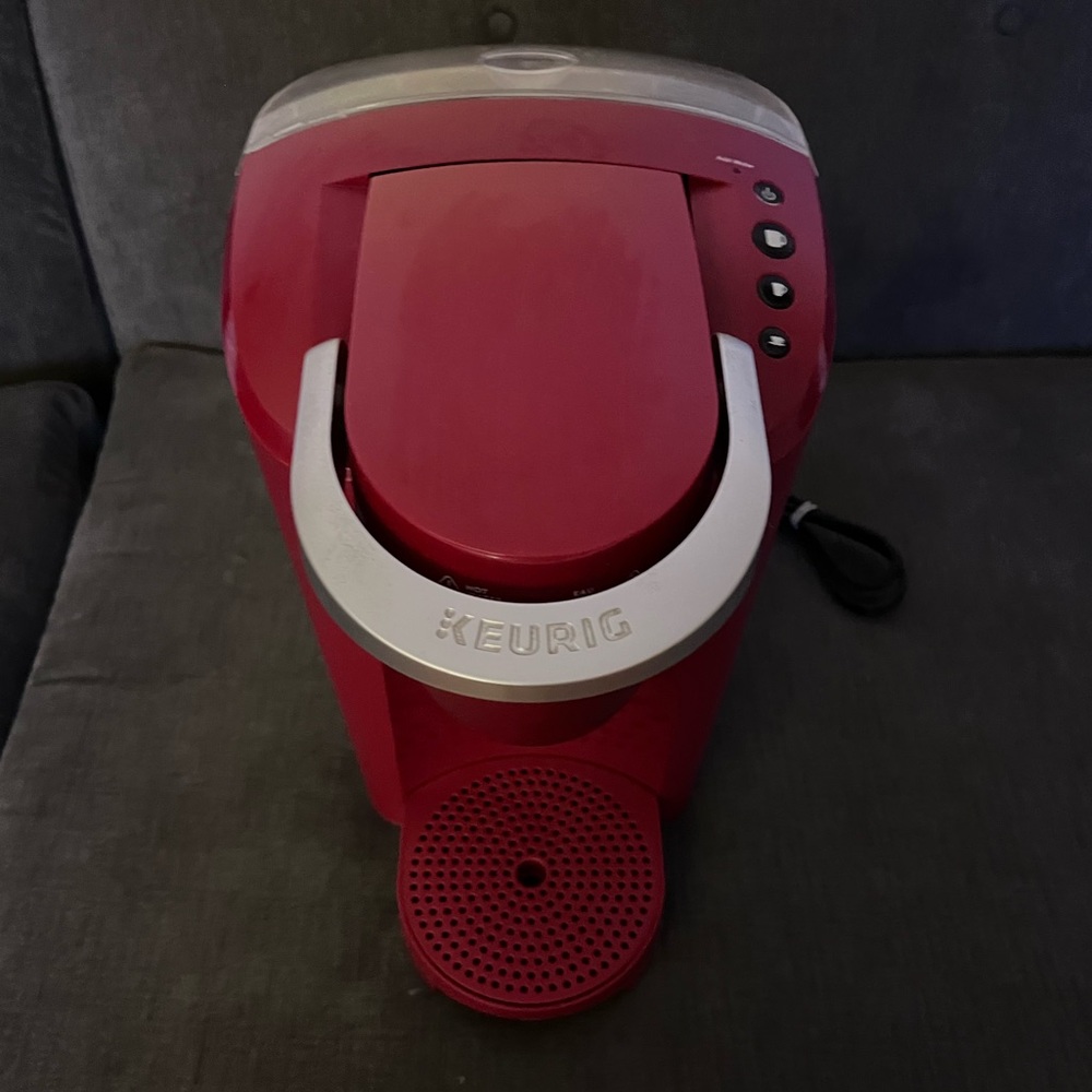 Red Keurig k cup brewer